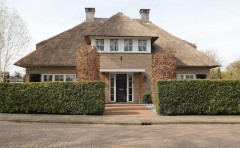 Woning huis rieten dak